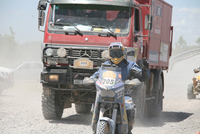 053 Chris Barriere Varju followed closely by a support truck IMG_8255.jpg